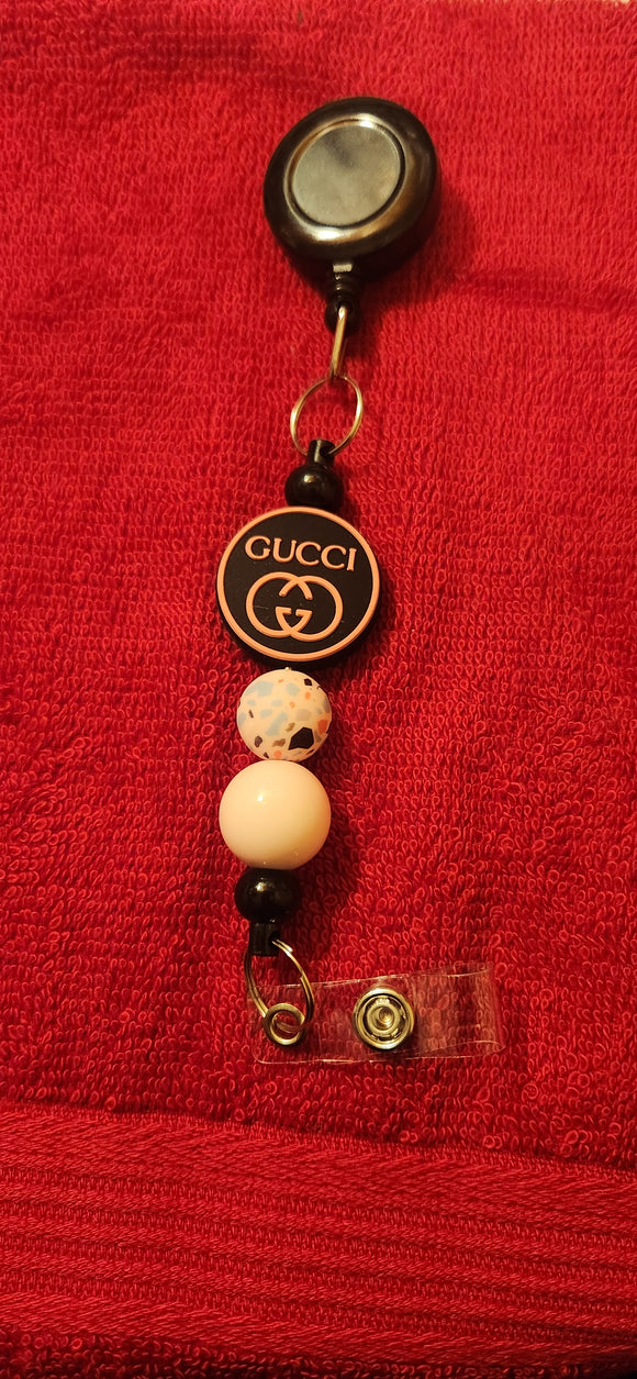 G G Badge Reel